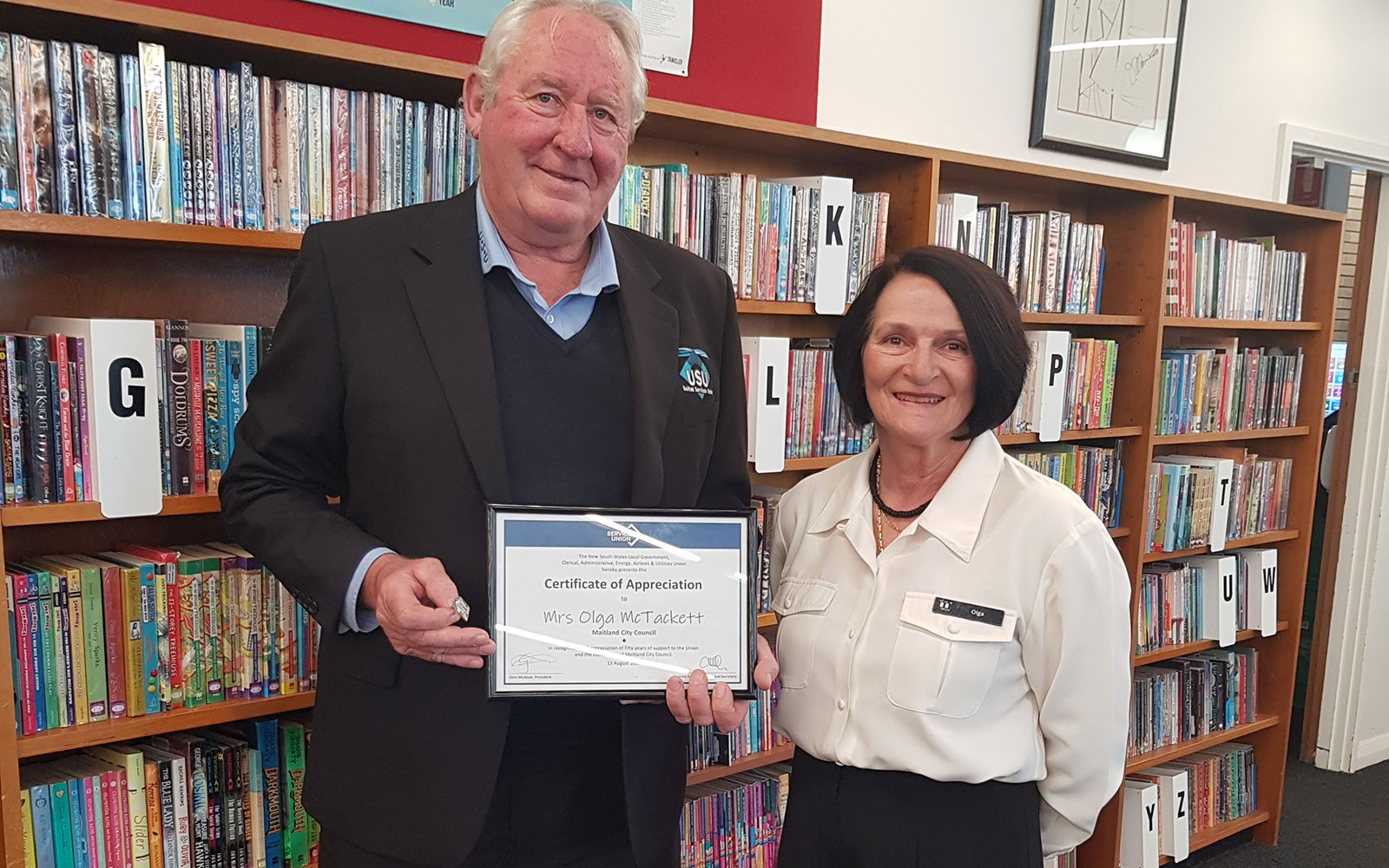 USU Organiser Leith Barber congratulates Olga McTackett on 50 years with Maitland City Council and 50 years USU membership.