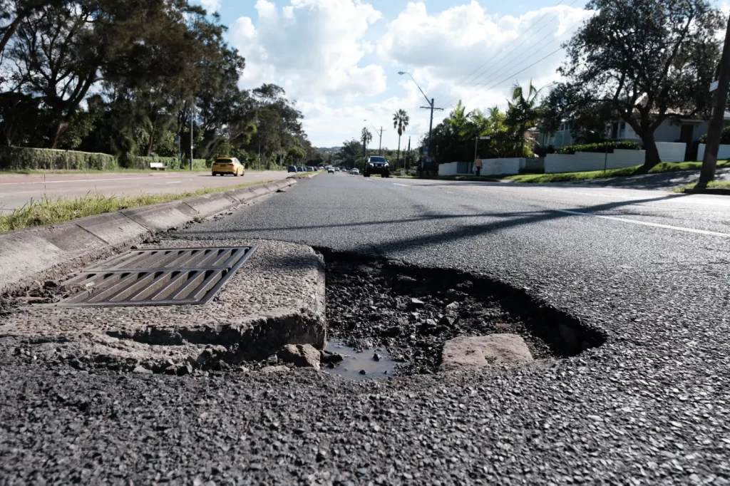 The cost of fixing local roads and footpaths has ballooned, leaving councils crying poor over rates and infrastructure contributions.CREDIT:OSCAR COLMAN